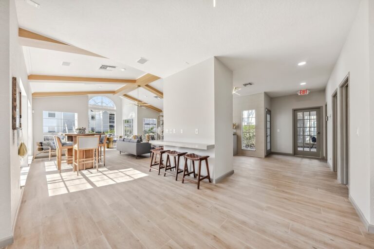 interior of clubhouse with multiple seating areas